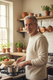 potraid of a middle-aged white man in the kitchen 